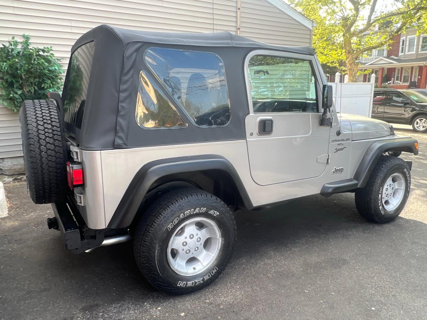 2001 SILVER Jeep Wrangler Sport (1J4FA49S21P) with an 4.0L L6 OHV 12V engine, located at 1018 Brunswick Ave, Trenton, NJ, 08638, (609) 989-0900, 40.240086, -74.748085 - Photo#4